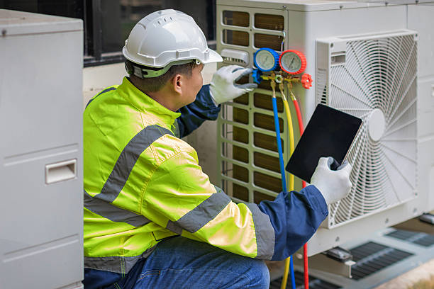 Professional Heat Pump Repair technician working in Dunlap, IN